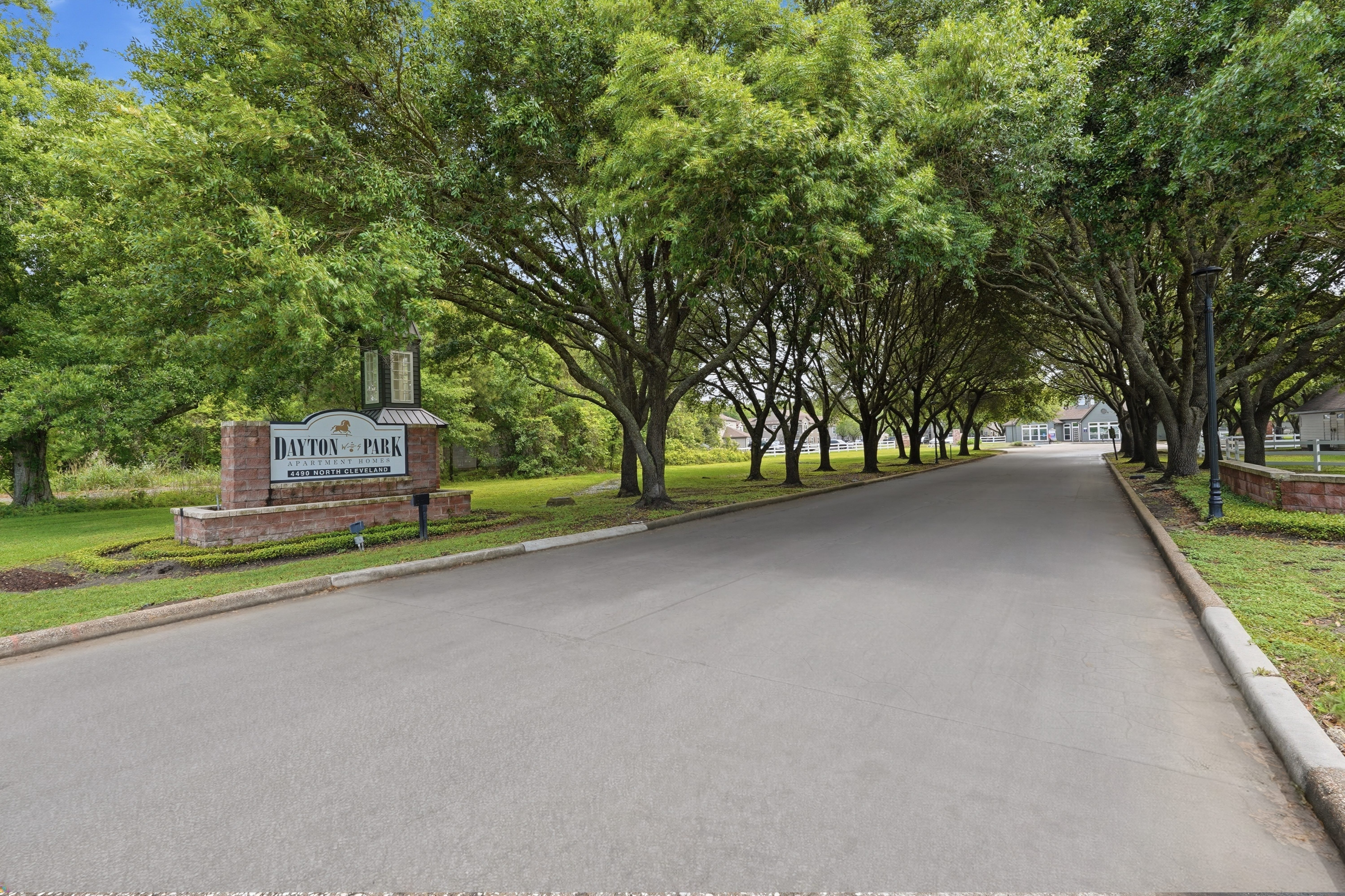 Driveway entrance at Dayton Park Apartments in Dayton TX